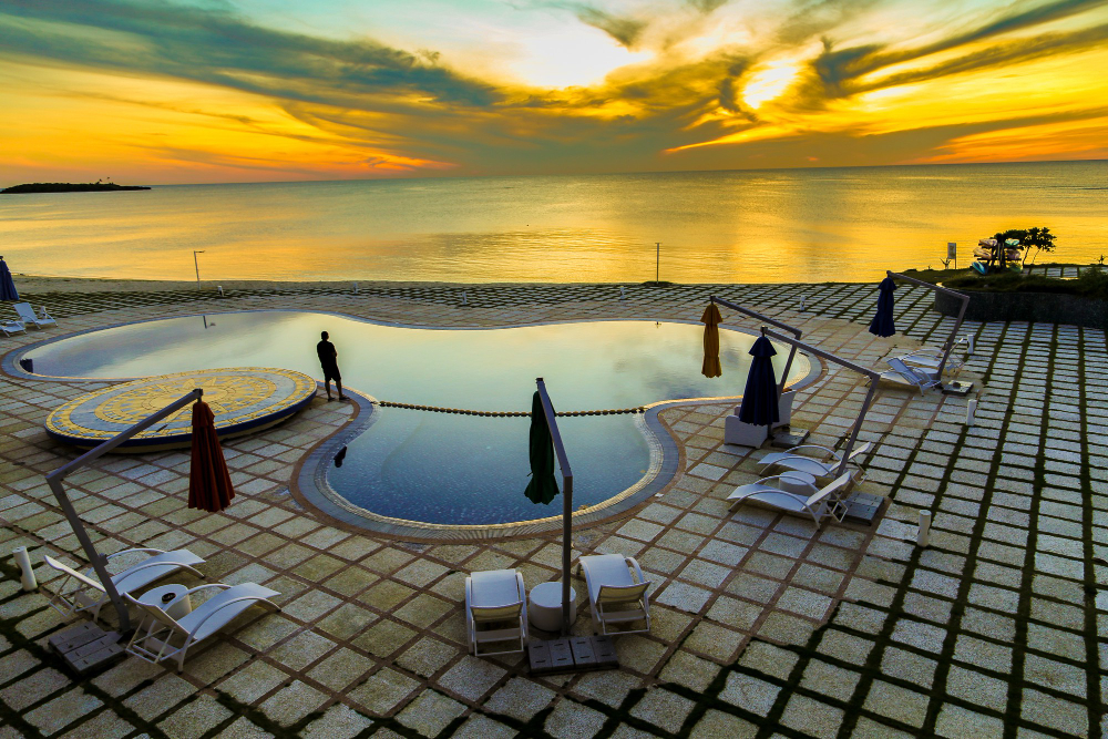 Maldives overwater villa at sunset