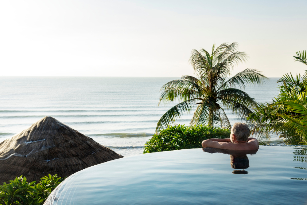 Luxury resort infinity pool overlooking ocean