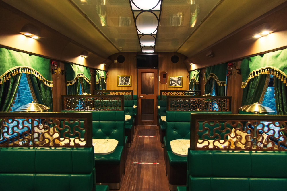 Ornate cabin interior of a luxury heritage train in Rajasthan, India