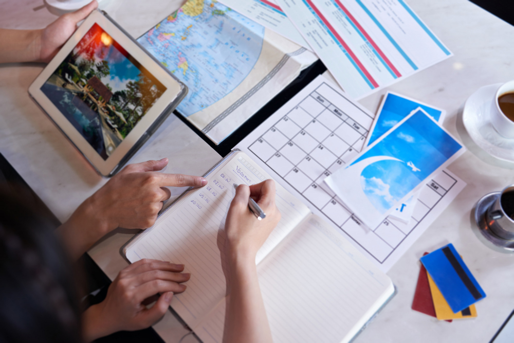 Travel journal with handwritten itinerary and map markers