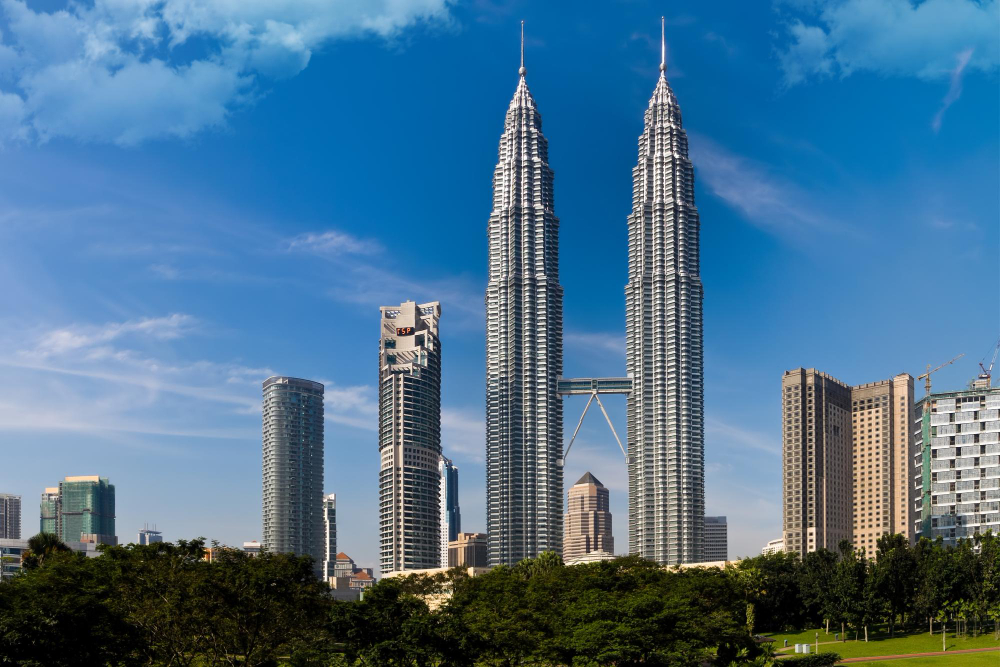 Petronas Twin Towers in Kuala Lumpur, Malaysia at sunset
