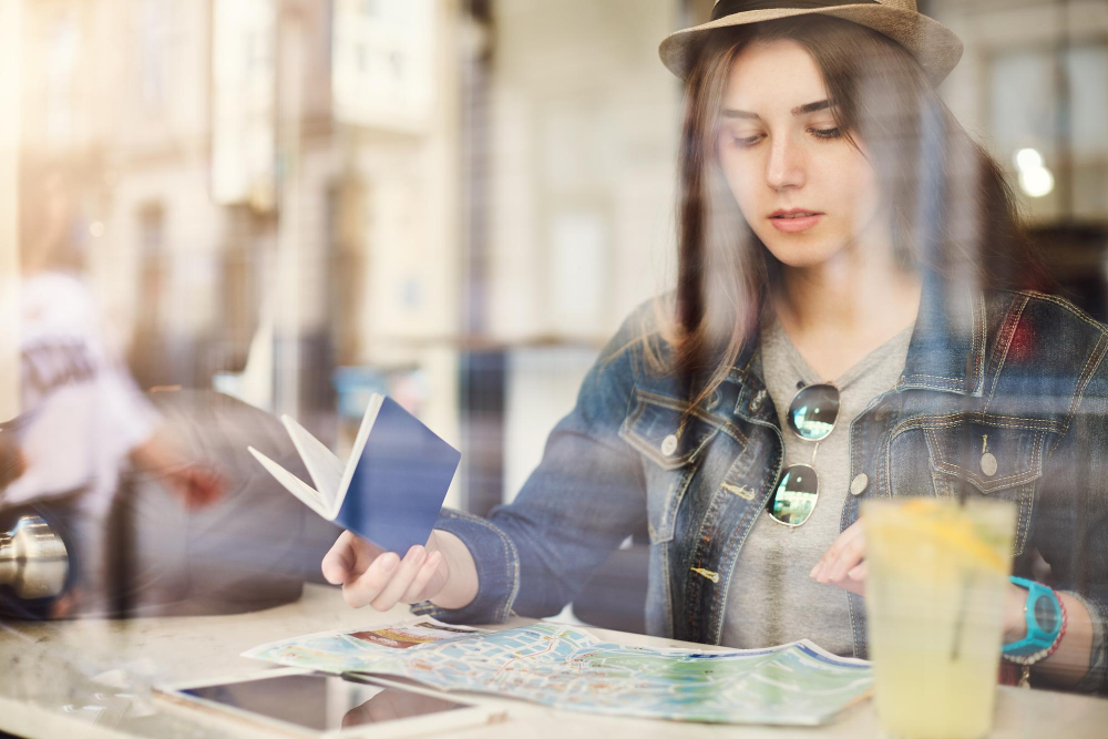 Plan your trip early Calendar on a phone with travel dates marked and airplane tickets
