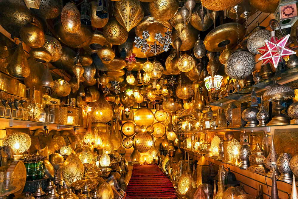 Marrakech souk with shoppers and ambient light