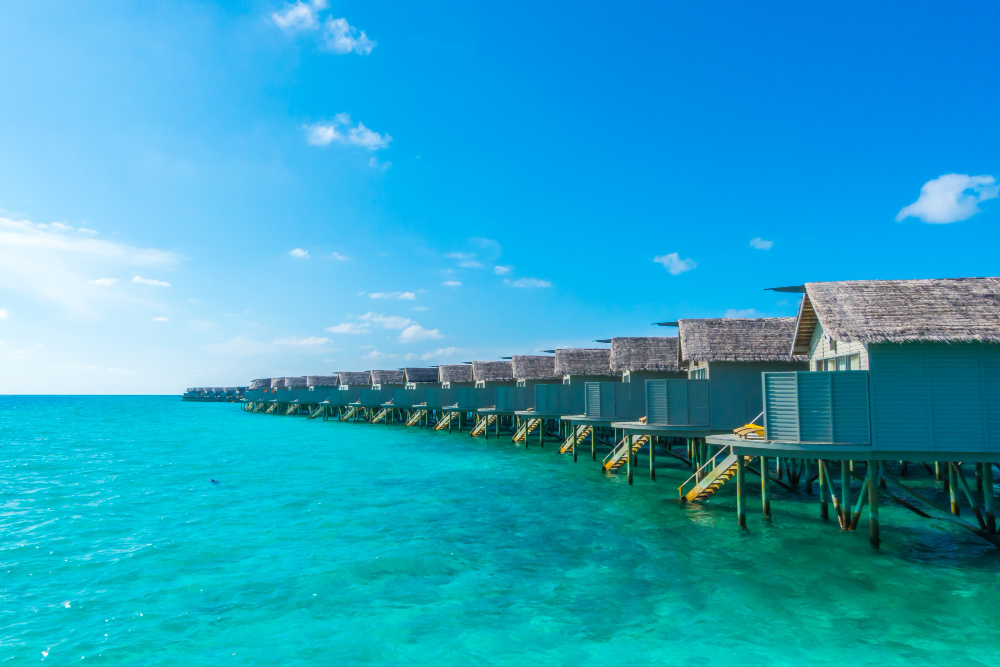 Luxury overwater villas in Maldives with turquoise lagoon
