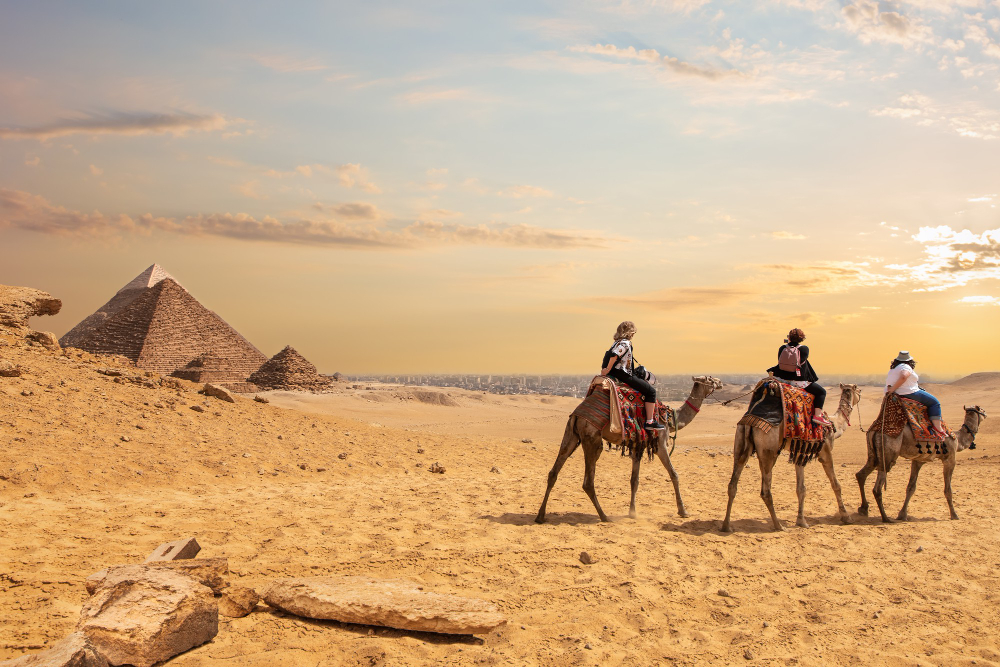 Great Pyramids of Giza with camel rider, Egypt